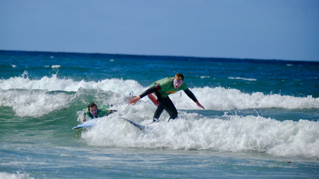 Ocean Sprint participant surfing